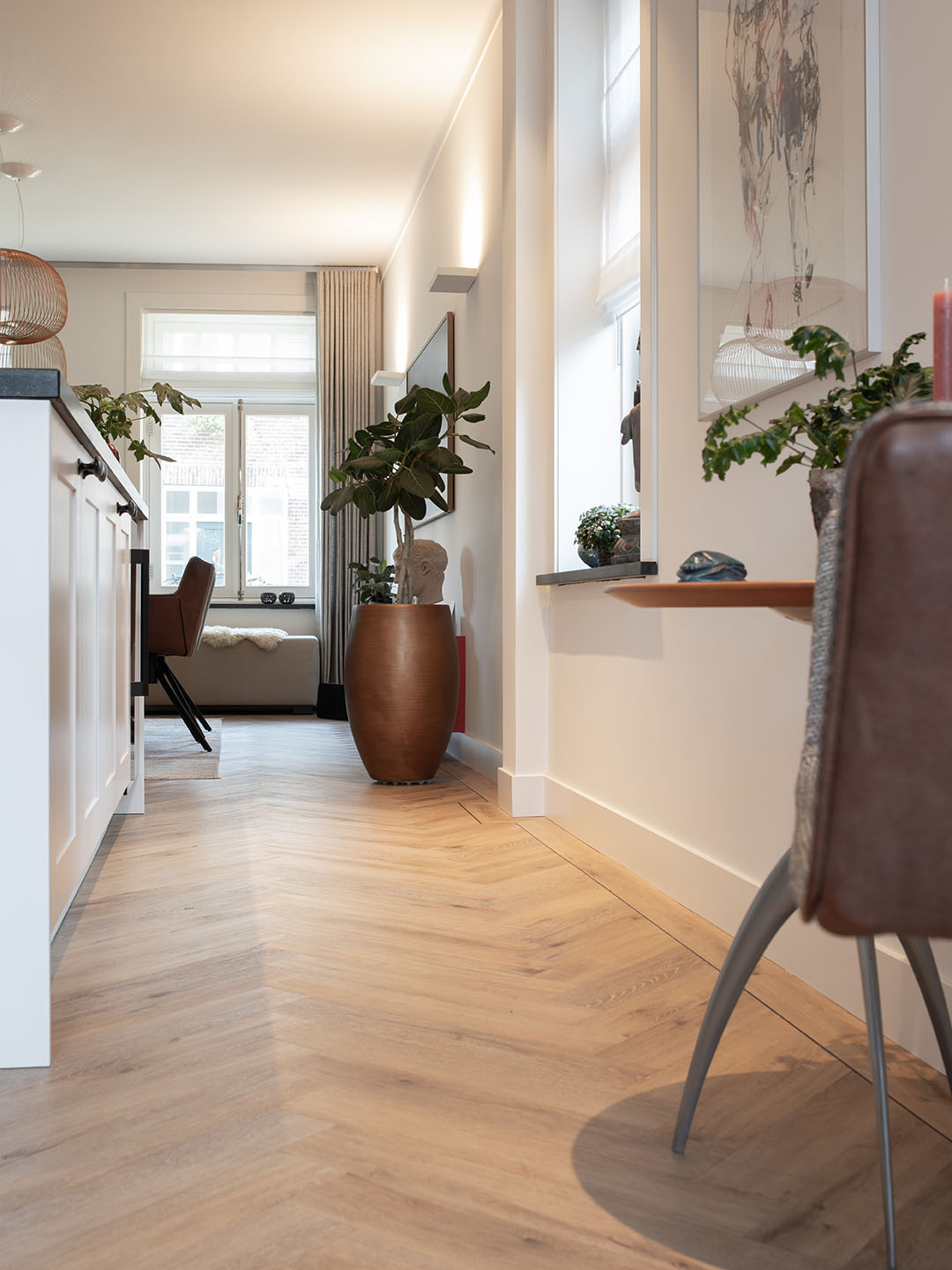 Houten vloer jaren 30 woning, visgraat vloer jaren 30, Hongaarse punt vloer karakteristieke woning, PVC houtlook jaren 30 interieur, De Paal Parket